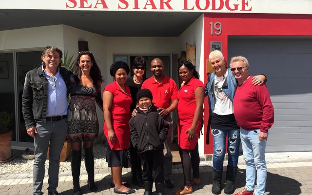Rocco (front) was very anxious to get on the boat, with his Mom, Lesley Lesperance behind him. Left are Frank and Rita van den Berg (Sea Star Lodge) with their staff members in the middle and right are Launa and Guy van Cuyck from Hermanus  